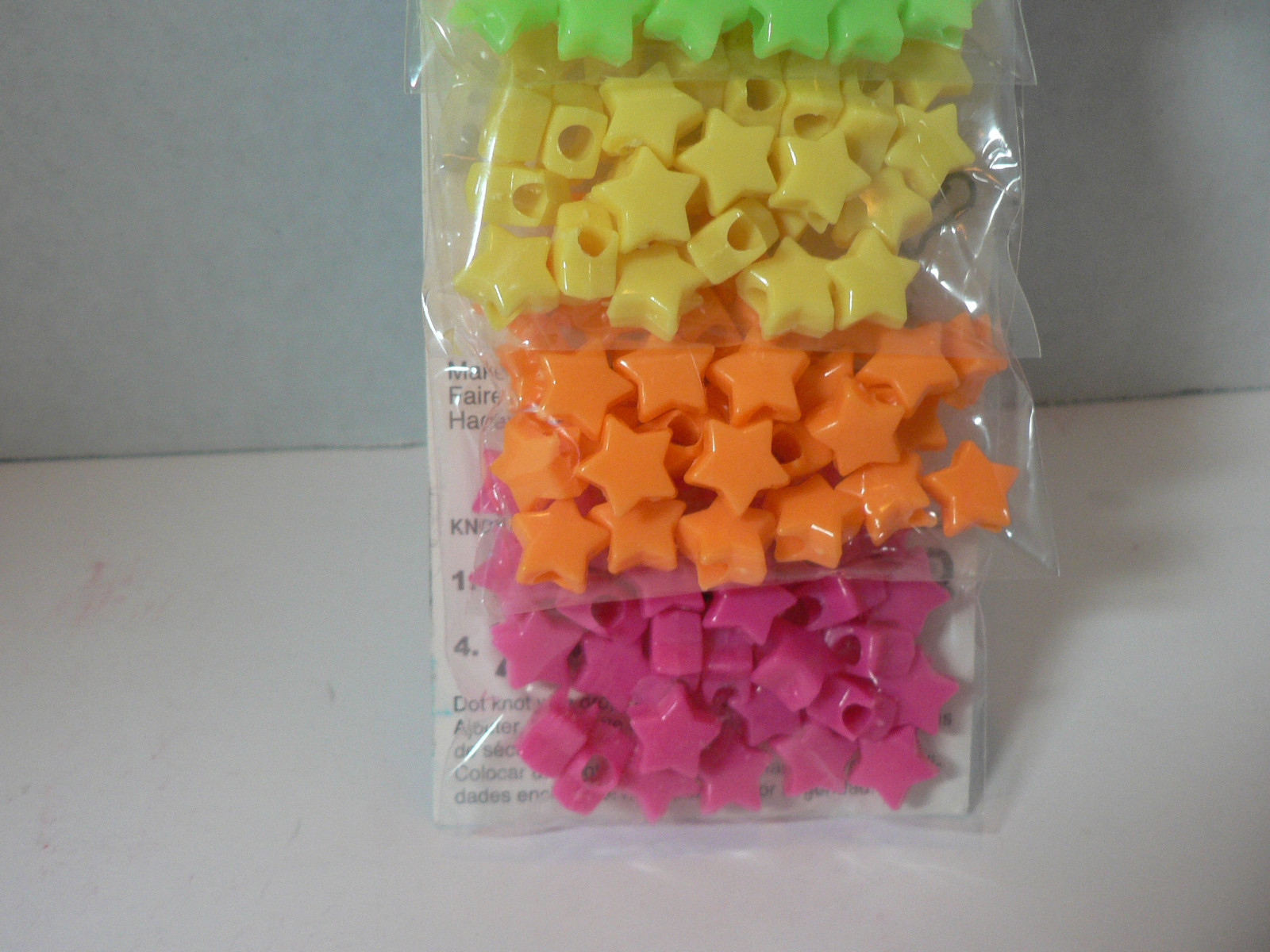 BEAD SAMPLE PACK  250 STAR SHAPED BEADS INCLUDING INSTRUCTIONS FOR JEWLERY