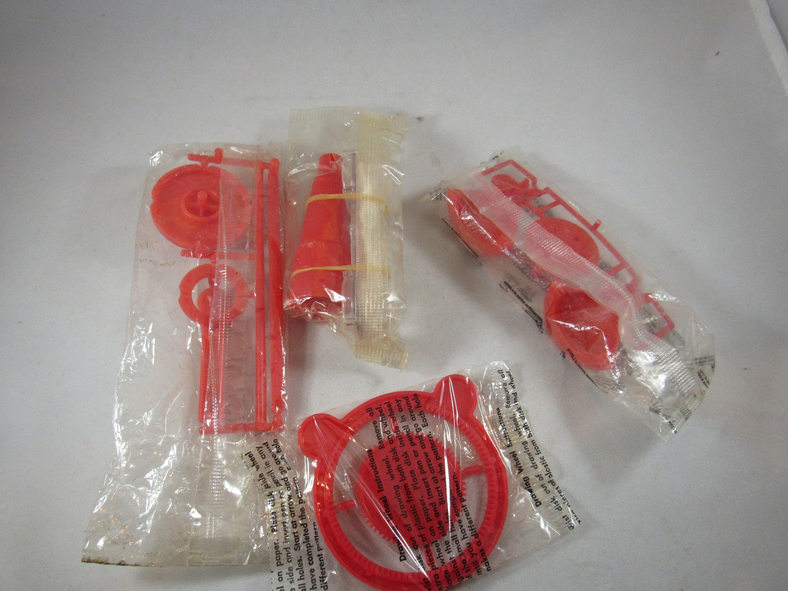 Cereal Premium Lot of 4 Assorted Red Toys in Sealed Bags Vintage Free Shipping