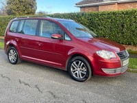 VW Touran 1.9 TDI SE 105BHP in Magenta Metallic with Grey Cloth Trim 6/Speed