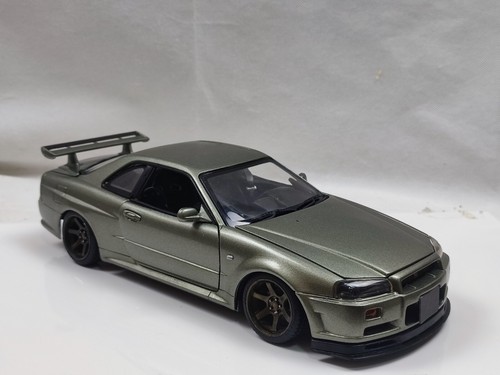 Motormax 1/18 Nissan Skyline R34 GTR Millennium Jade Custom