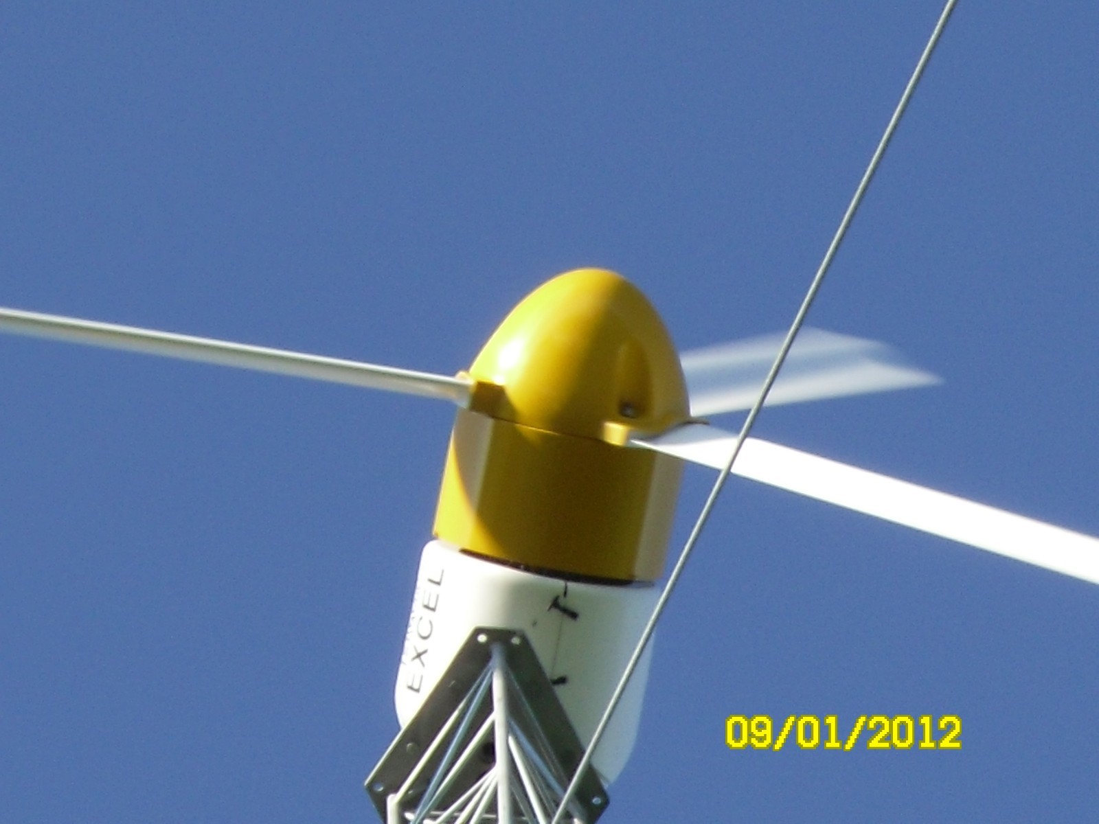 Bergey wind turbine 10k complete system with 140 ft guyed lattice tower.