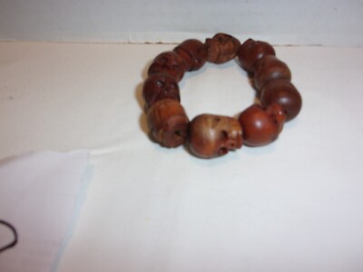 WOODEN HANDCARVED SKULL STRETCH BRACELET 3/4IN. SKULLS (10 SKULLS ON BRACELET)