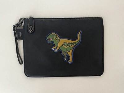 Coach dinosaur best sale clutch
