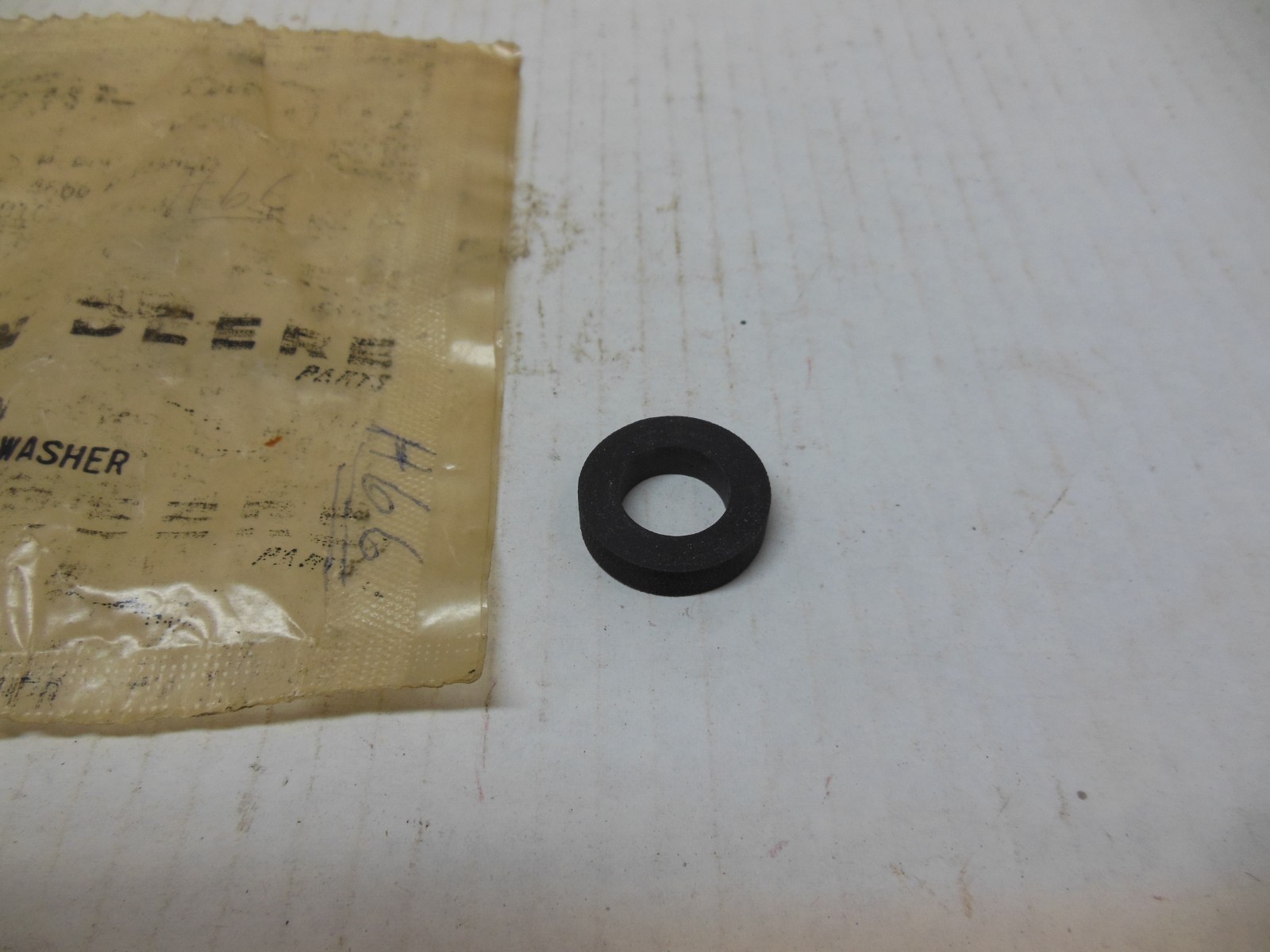 JOHN DEERE TRACTOR HOOD GRILLE TIN RUBBER WASHER SPACER A4666R