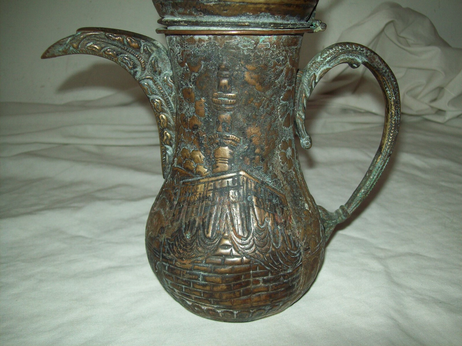 antique  Islamic copper Dallah coffe pot with embossed mosque design