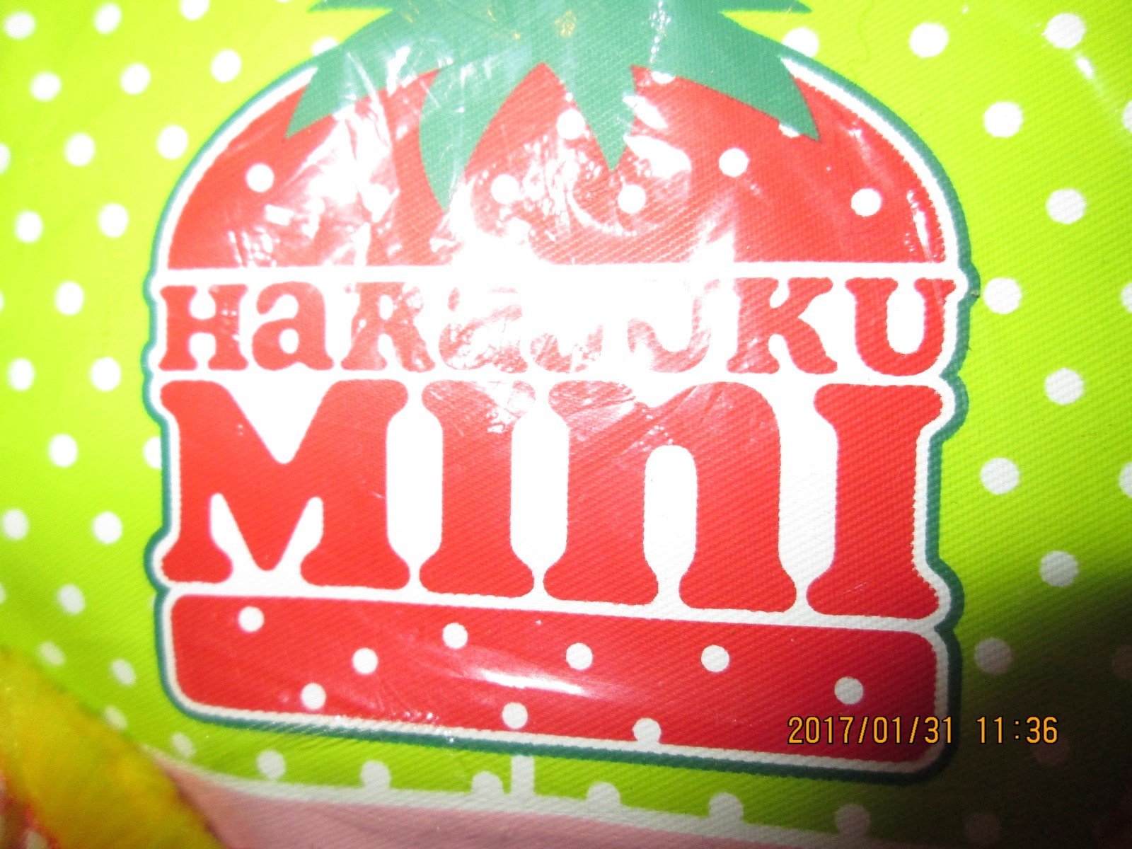 Sling bag that folds into a super Kawaii Dangle- green w/ white polka dots