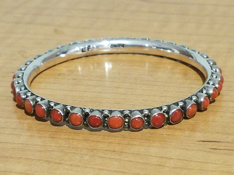 Leo Francis, Navajo. NEW/Vintage coral/sterling silver bangle bracelet; 1994