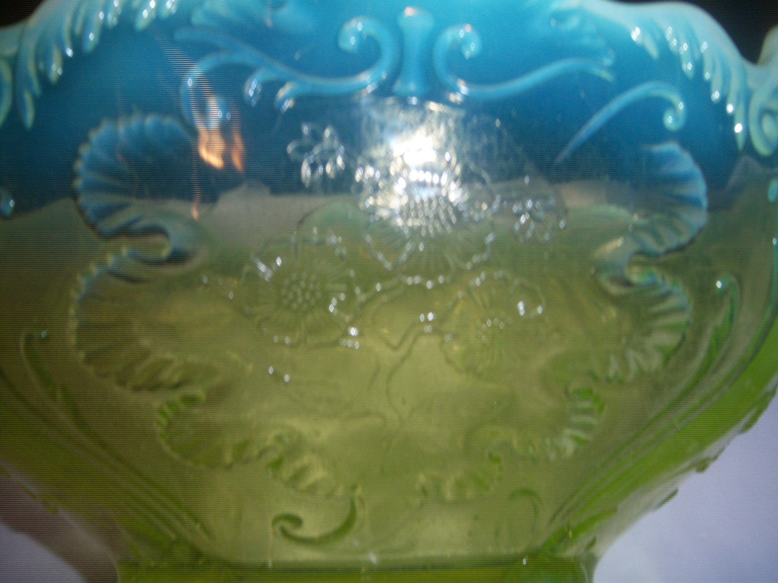 .LARGE VASELINE GLASS FRUIT BOWL WITH OPALESCENT EDGE