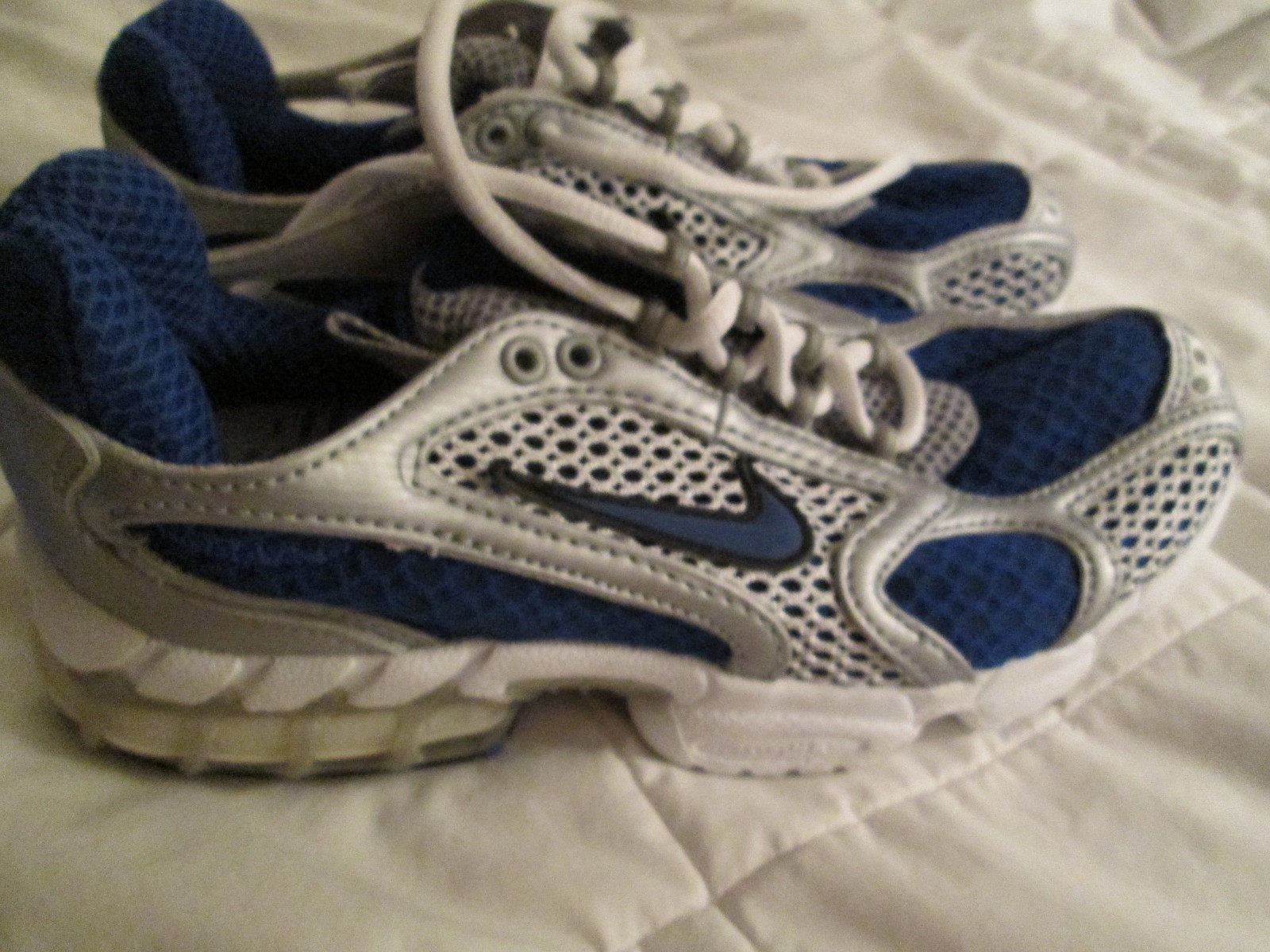 purple and white nike air max 97