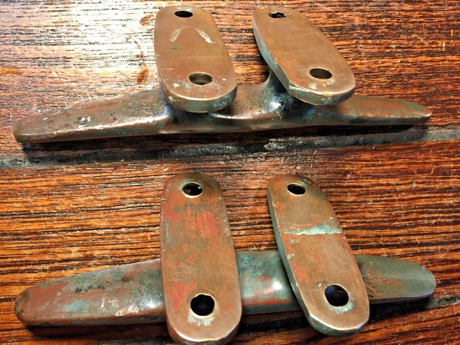 PAIR OF VINTAGE OLD SOLID BRONZE CLEATS 6