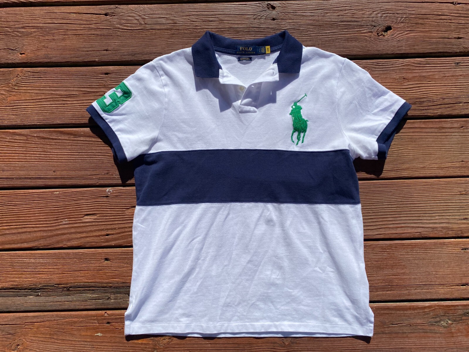 white polo with green horse