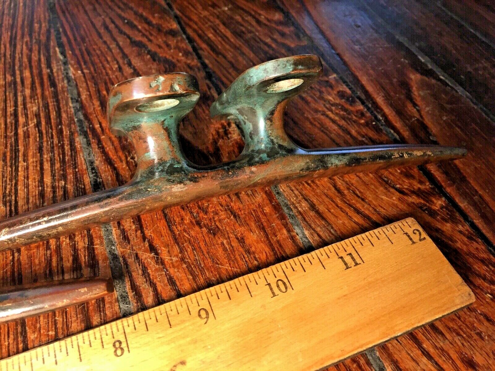 PAIR OF VINTAGE SOLID BRONZE CLEATS 8