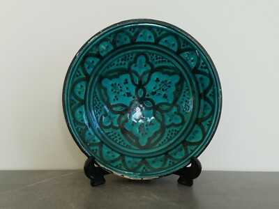 green ceramic plate whit persian writing for love