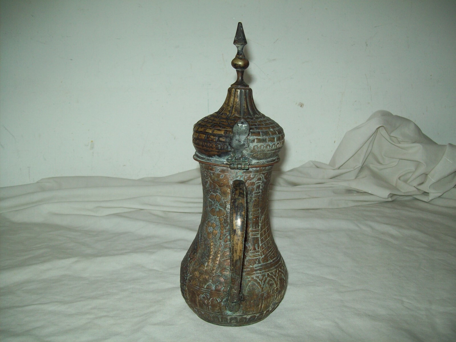 antique  Islamic copper Dallah coffe pot with embossed mosque design