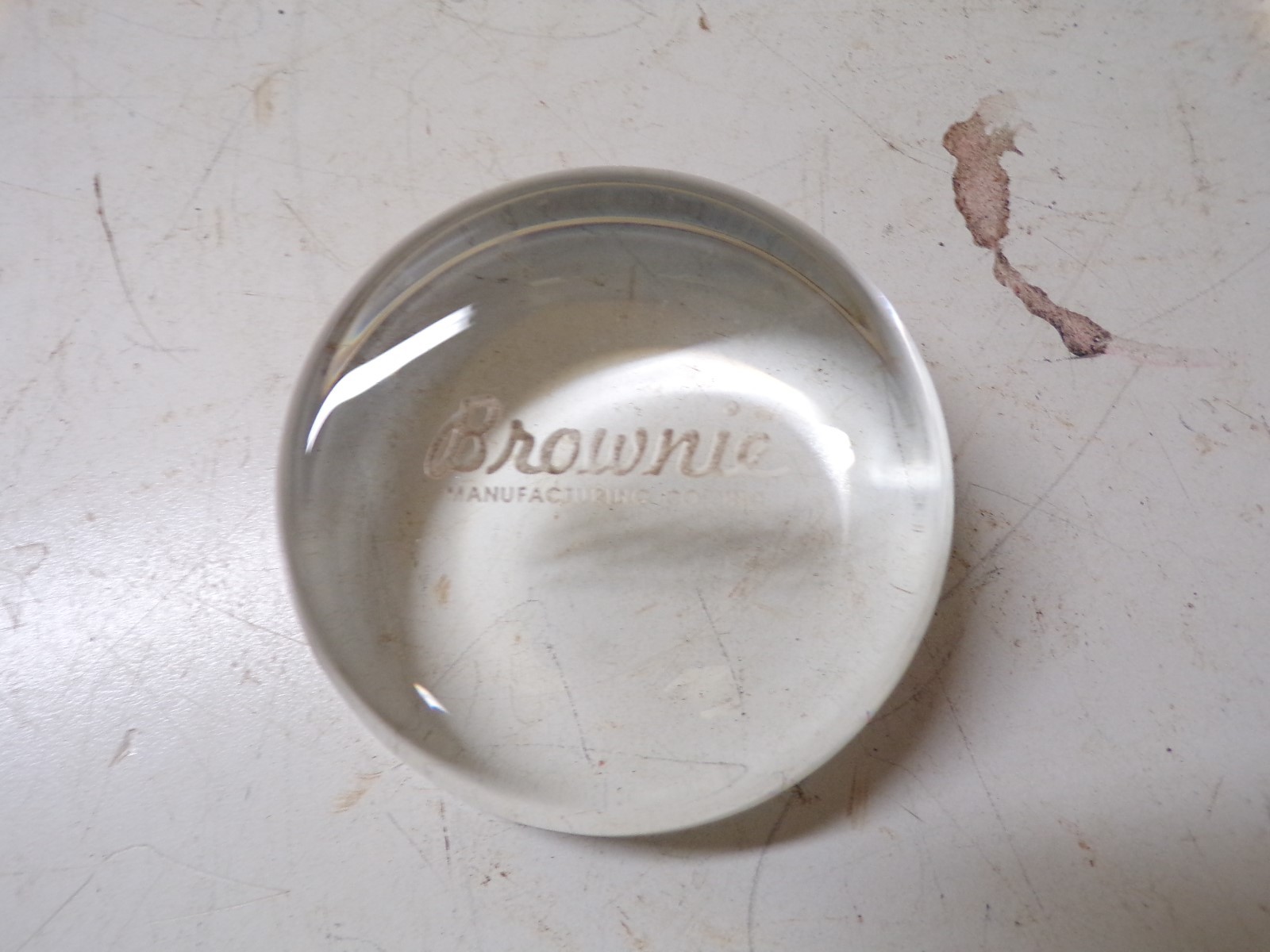 Old Round Dome Glass Paperweight Brownie Manufacturing Co.