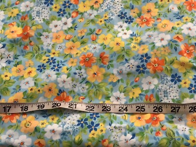New BTY, 44/45  w very, very pretty multicolor floral on blue poly/cotton Fabric