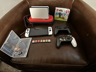 FULL NINTENDO SWITCH SETUP WITH 2 PRO CONTROLLER AND GAMES