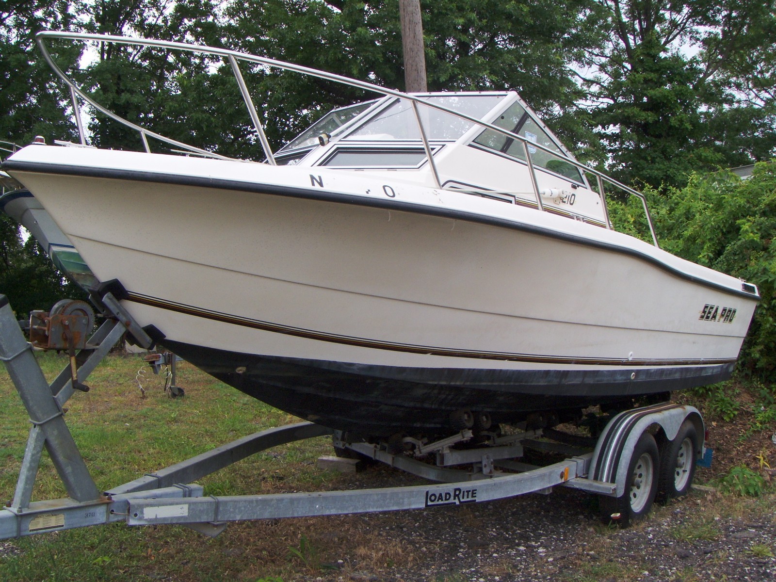 1994 Sea Pro 210 Boat Walkaround Cuddy w/ Load Rite Tandem Axle Roller Trailer