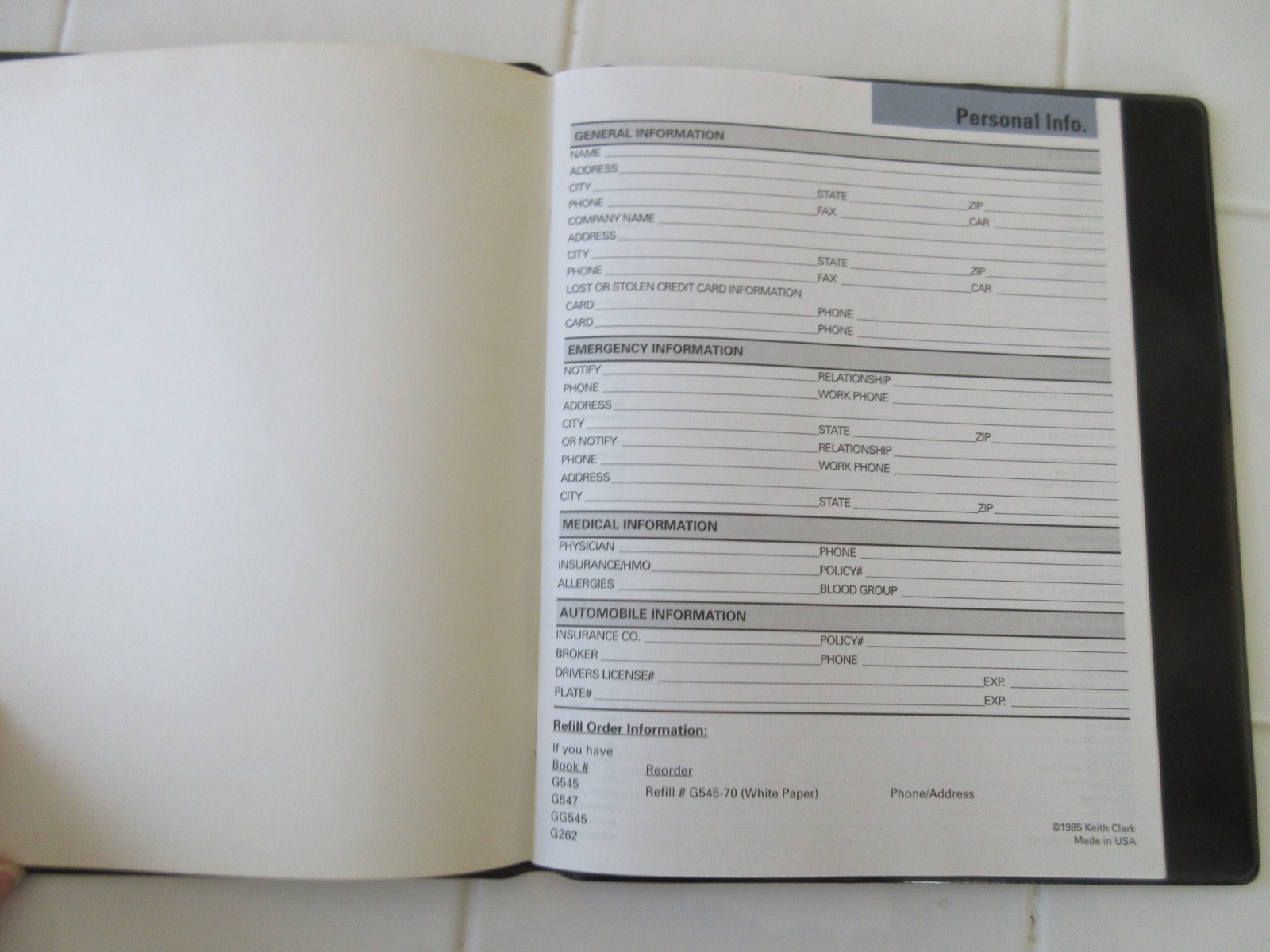 Address Book enclosed in Black Vinyl Folder.  9”x7.5”