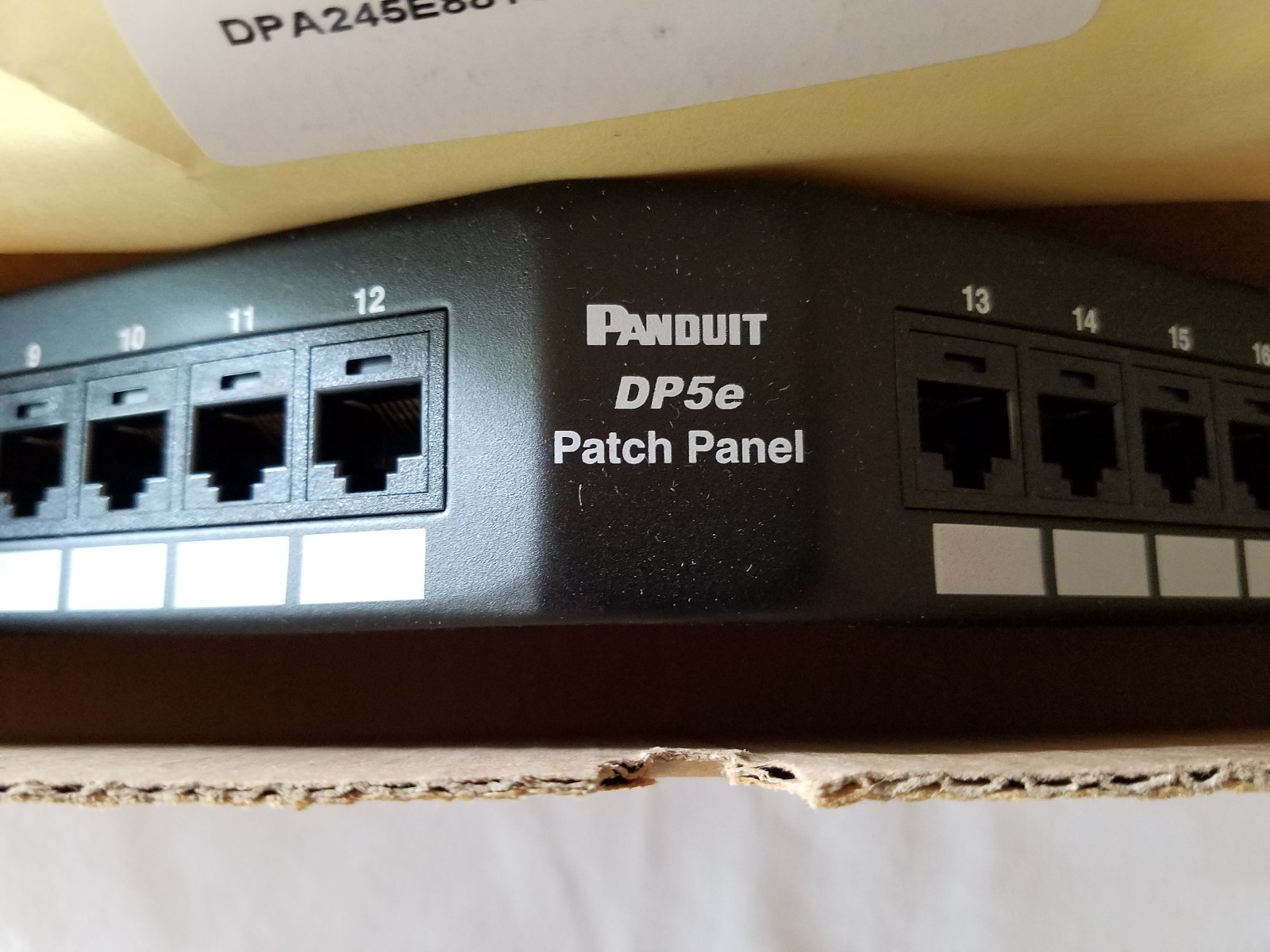 DPA245E88TGY Panduit Category 5e 24-Port Patch Panel Angled 1RU
