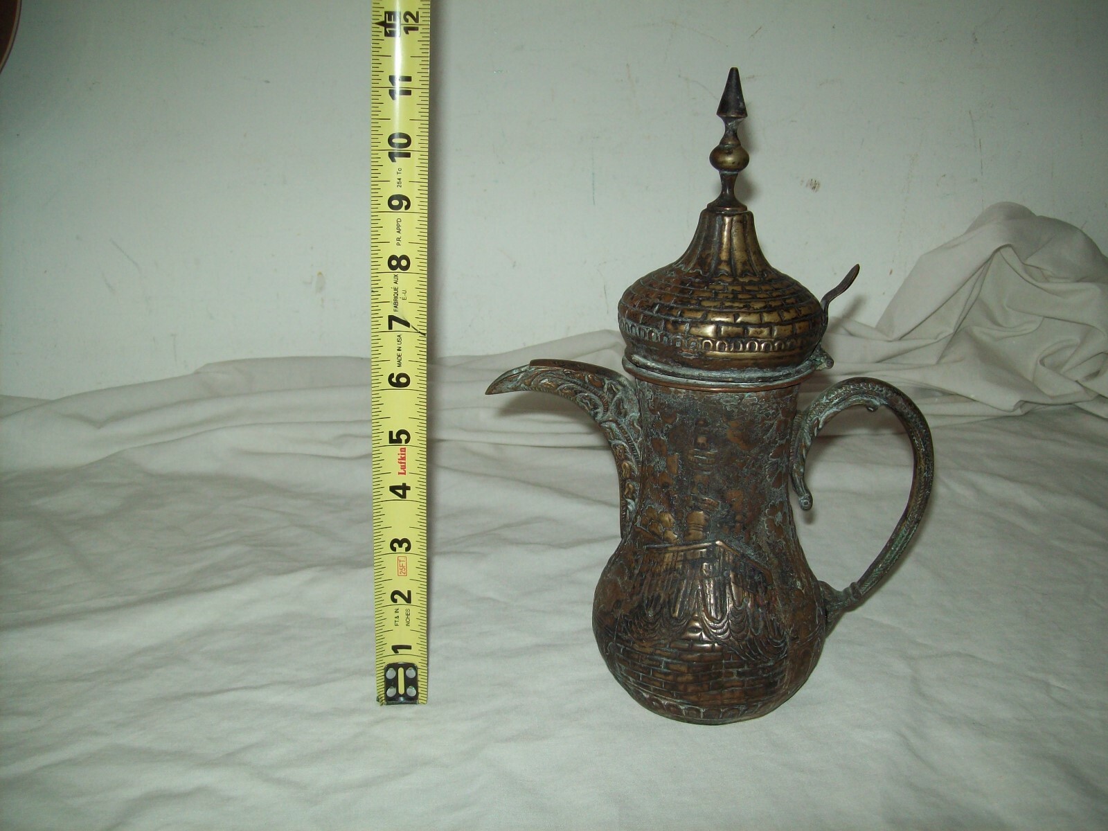 antique  Islamic copper Dallah coffe pot with embossed mosque design