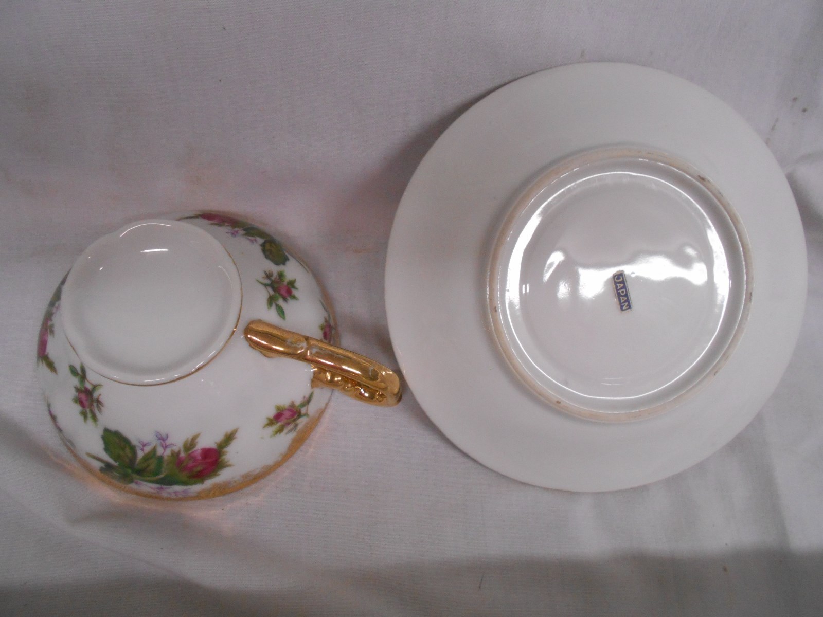 vintage Japan tea cup & saucer pedestal gold with rose buds