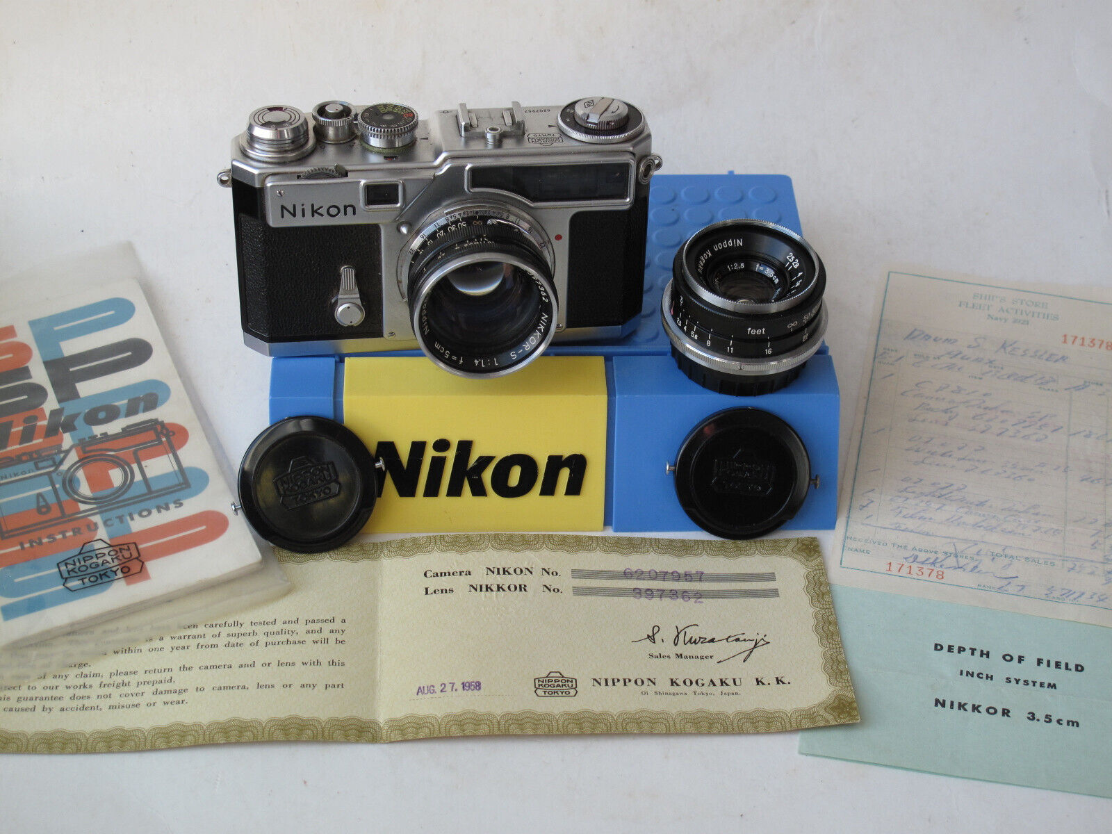 Nikon SP with 50/1.4 35/2.5 black lenses, cards, receipt Nikon SP with 50/1.4 35/2.5 black lenses, cards, receipt