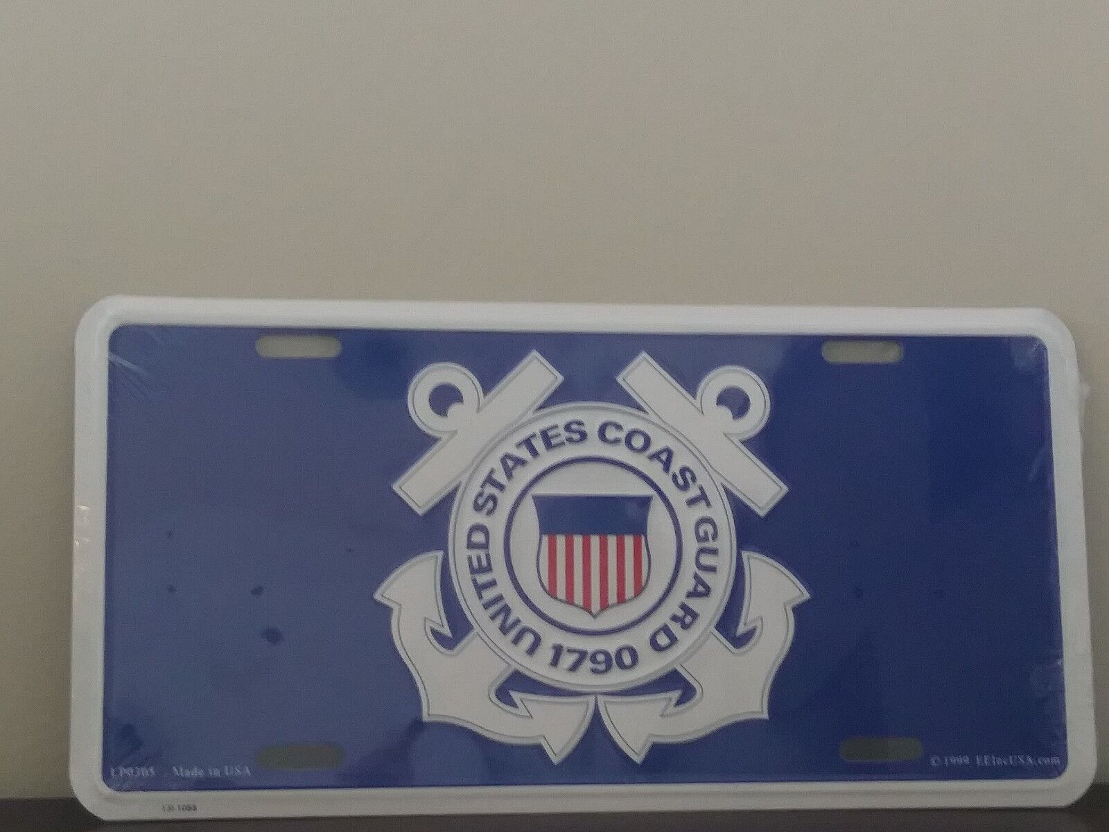 United States Coast Guard with USCG Logo on Blue Embossed License Plate