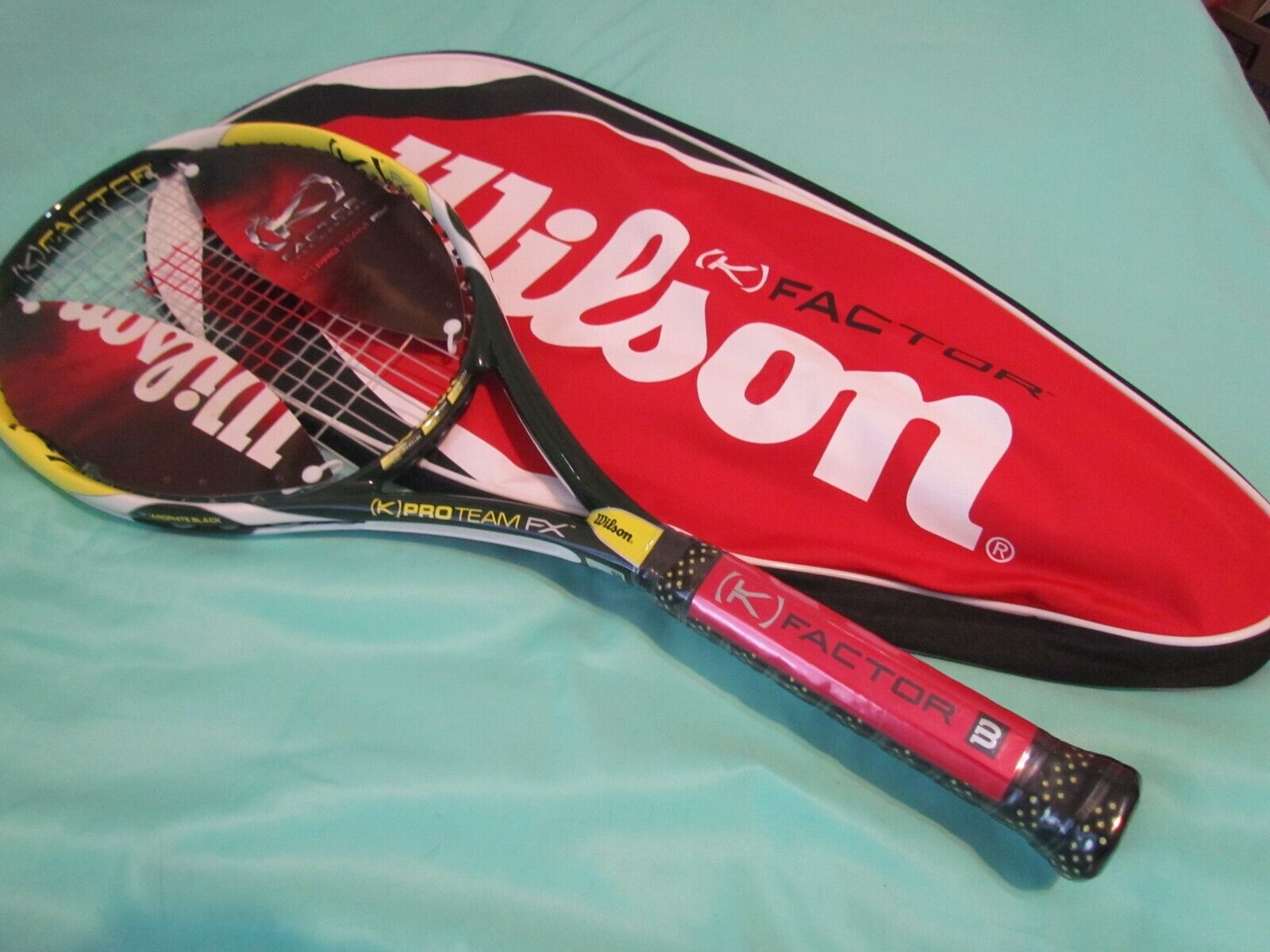 NOS Wilson K Factor K Pro Team FX Grip 4 3/8 (USL3) Tennis NOS Wilson K Factor K Pro Team FX Grip 4 3/8 (USL3) Tennis