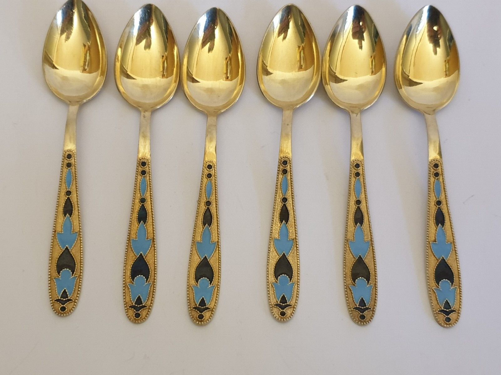 Enamel shop spoons antique