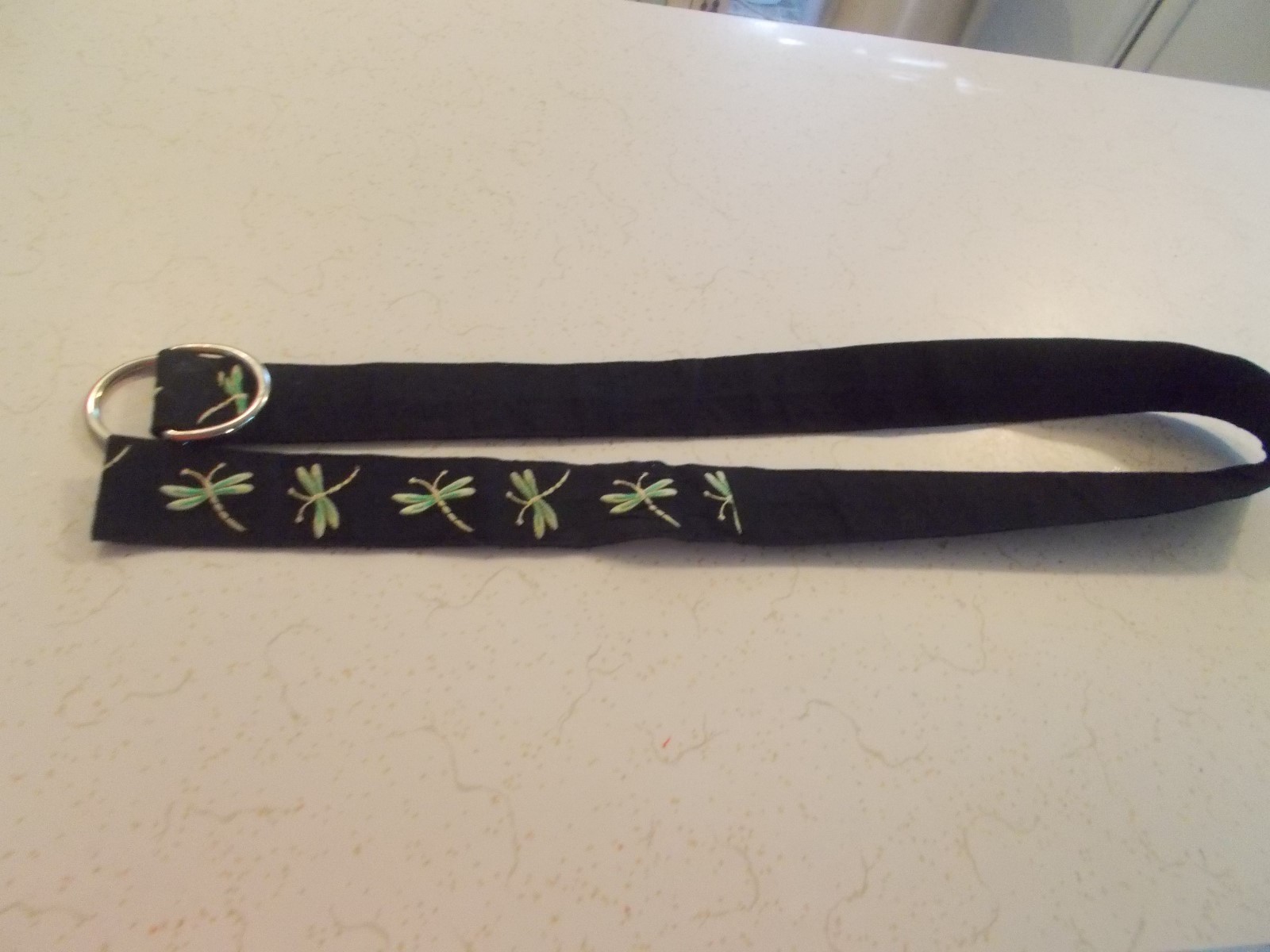 LADIES CLOTH DRAGON  FLY STITCHED  BELT  BLACK GROUND METAL LOOPS 39 1/2 INCHES