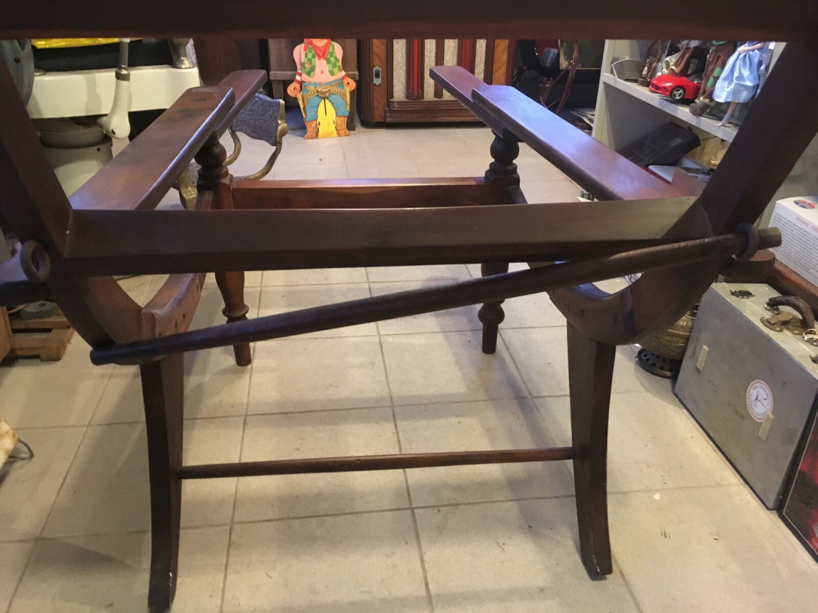 LARGE ANTIQUE PLANTATION CHAIR WITH FOLD OUT ARMS AND ROLLED FABRIC HOLDERS