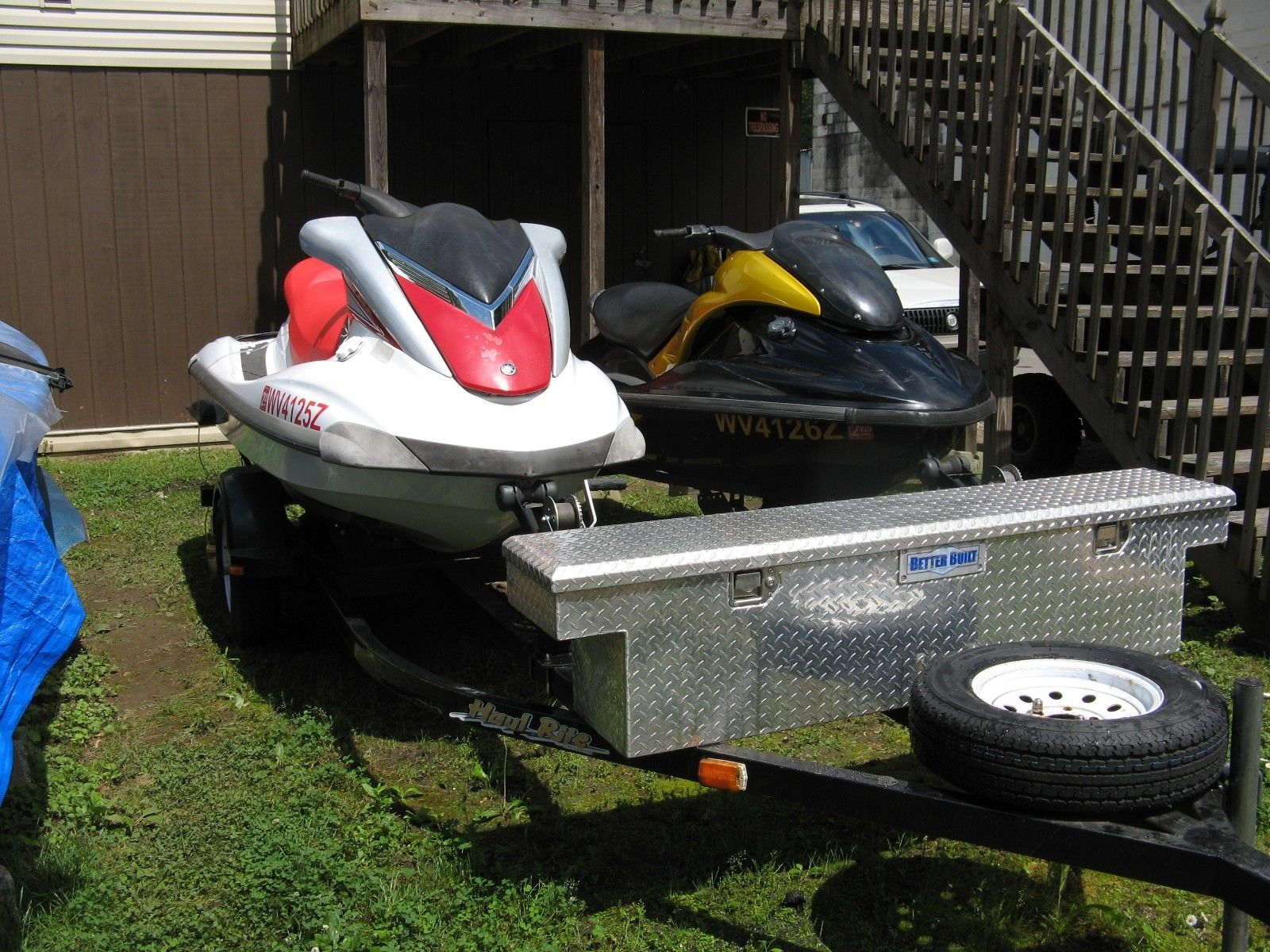 2- 2006 YAMAHA JETSKI AND TRAILER 48HOURS WHITE ONE 64HOURS BLACK ONE