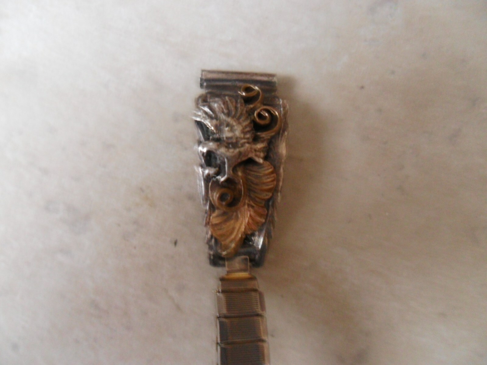 J.B. Sterling Eagle on Gold Colored Leaf Tips Ladies Watch Band