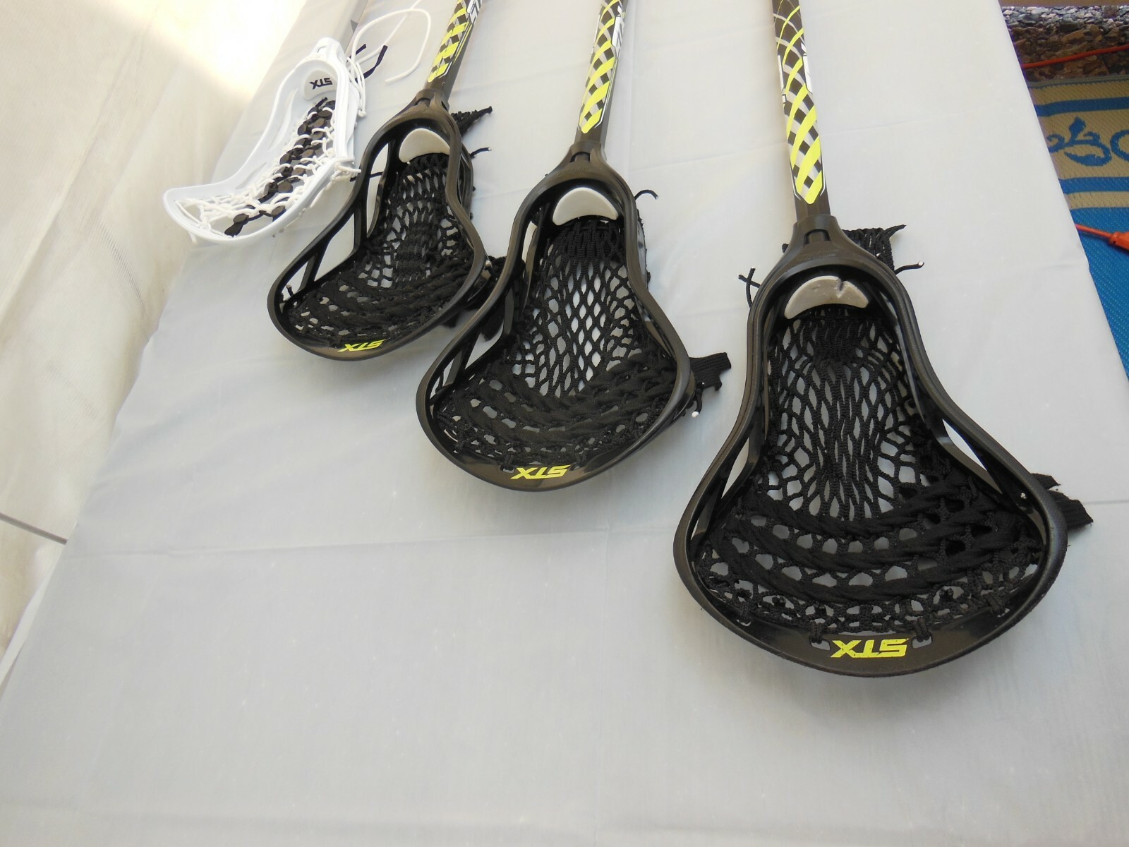 Set of 3 STX 200 On 6000 Stallion Lacrosse Sticks and One STX 7075 Stick Total 4