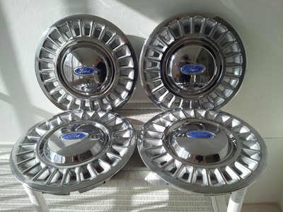 4 NOS OEM 19951997 FORD CROWN VICTORIA 15quot STAINLESS STEEL HUBCAPS E8AC1130BA