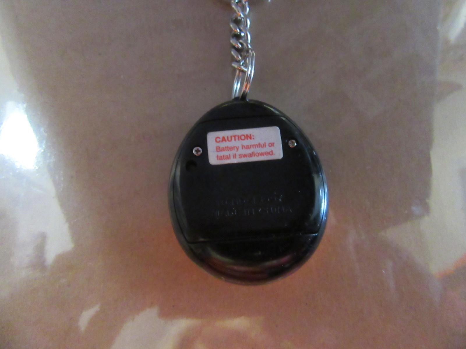 Original Tamagotchi 1997 (Black & Orange)  Key Chain untested