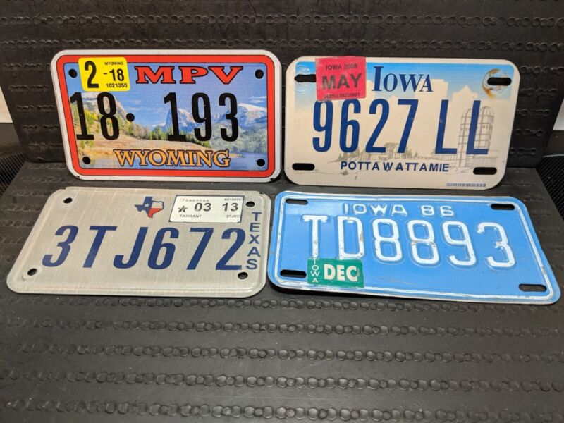 LOT of 4 MOTORCYCLE LICENSE PLATES FROM 4 DIFFERENT STATES .. IA - WY - TX- IA
