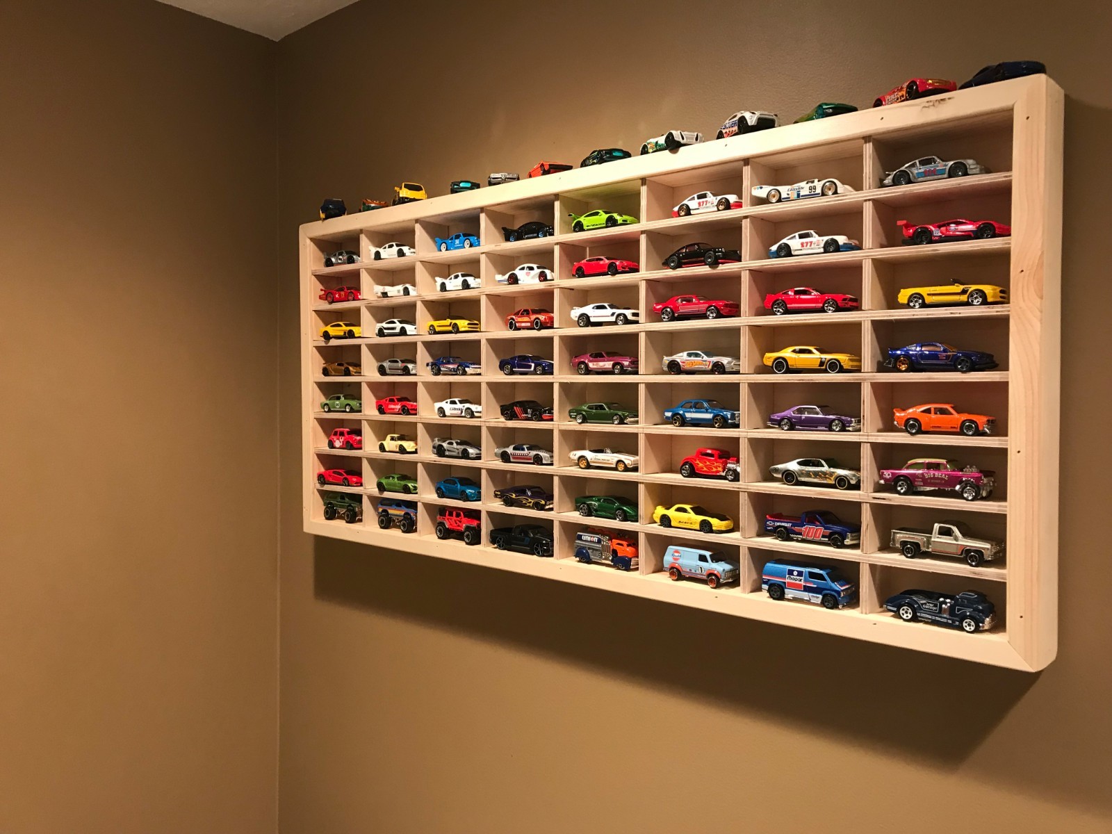 Hot wheels display case , custom made wood case that holds 64 cars