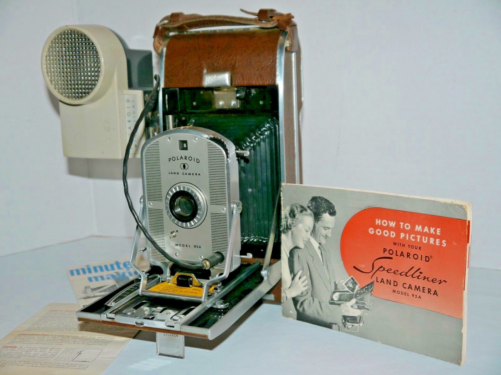 Polaroid speedliner land camera #95a w/polaroid wink-light-camera manuals