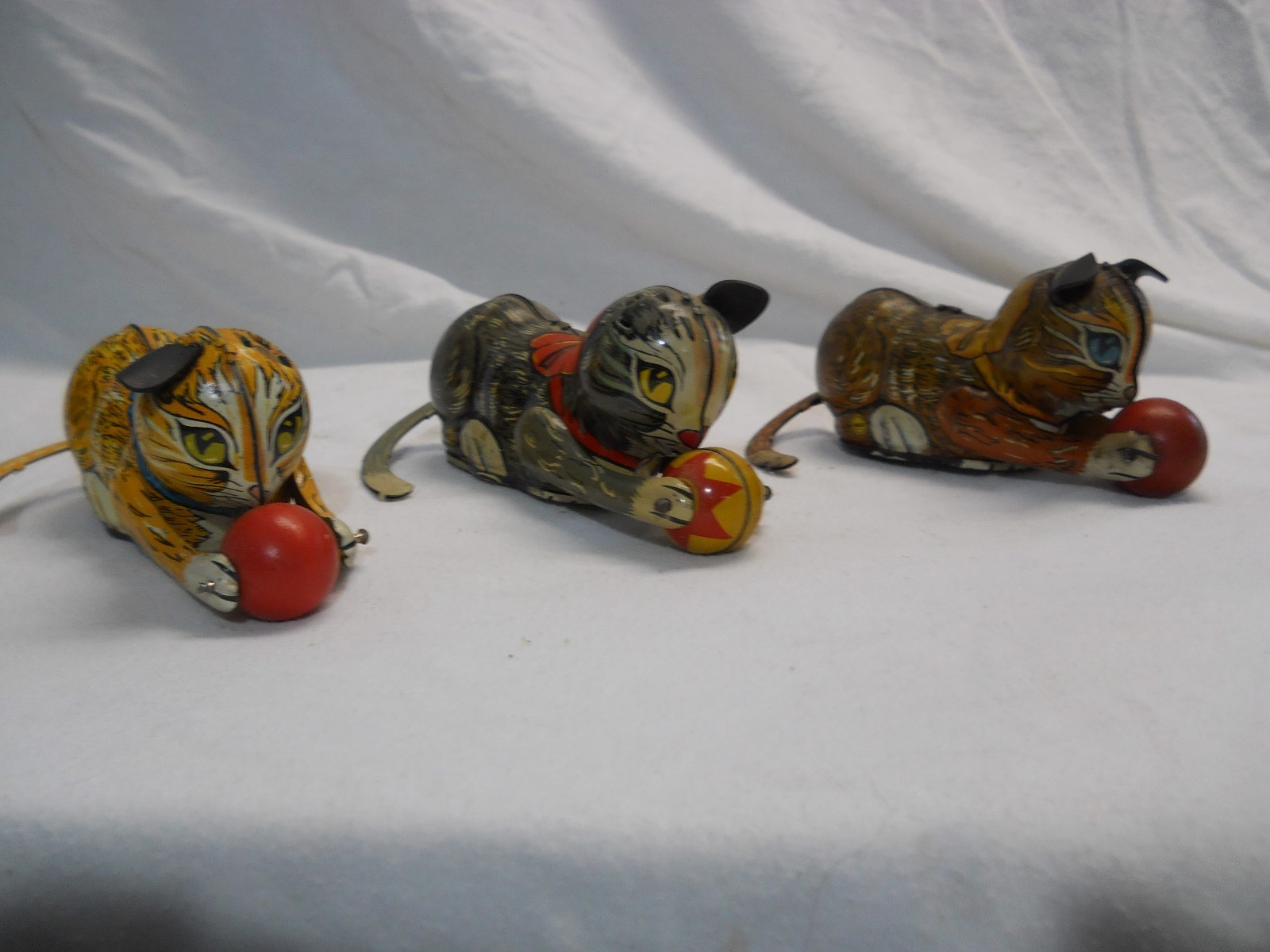 Three 1940's Marx Cat Rollover Wind-up Toys