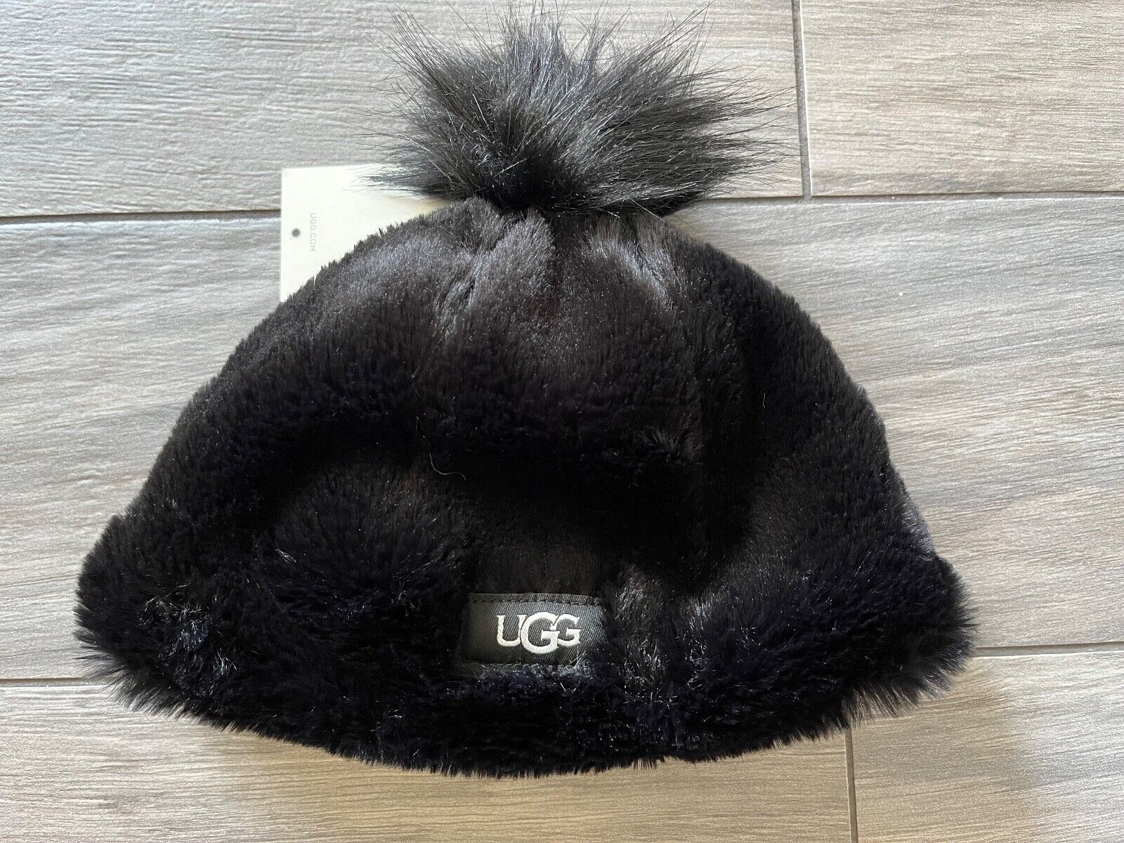 UGG KIDS FAUX FUR BEANIE WITH POM POM, BLACK, NWT $65 UGG KIDS FAUX FUR BEANIE WITH POM POM, BLACK, NWT $65