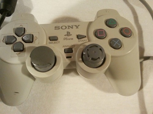 Playstation controllers and network adapter sold as lot not tested.