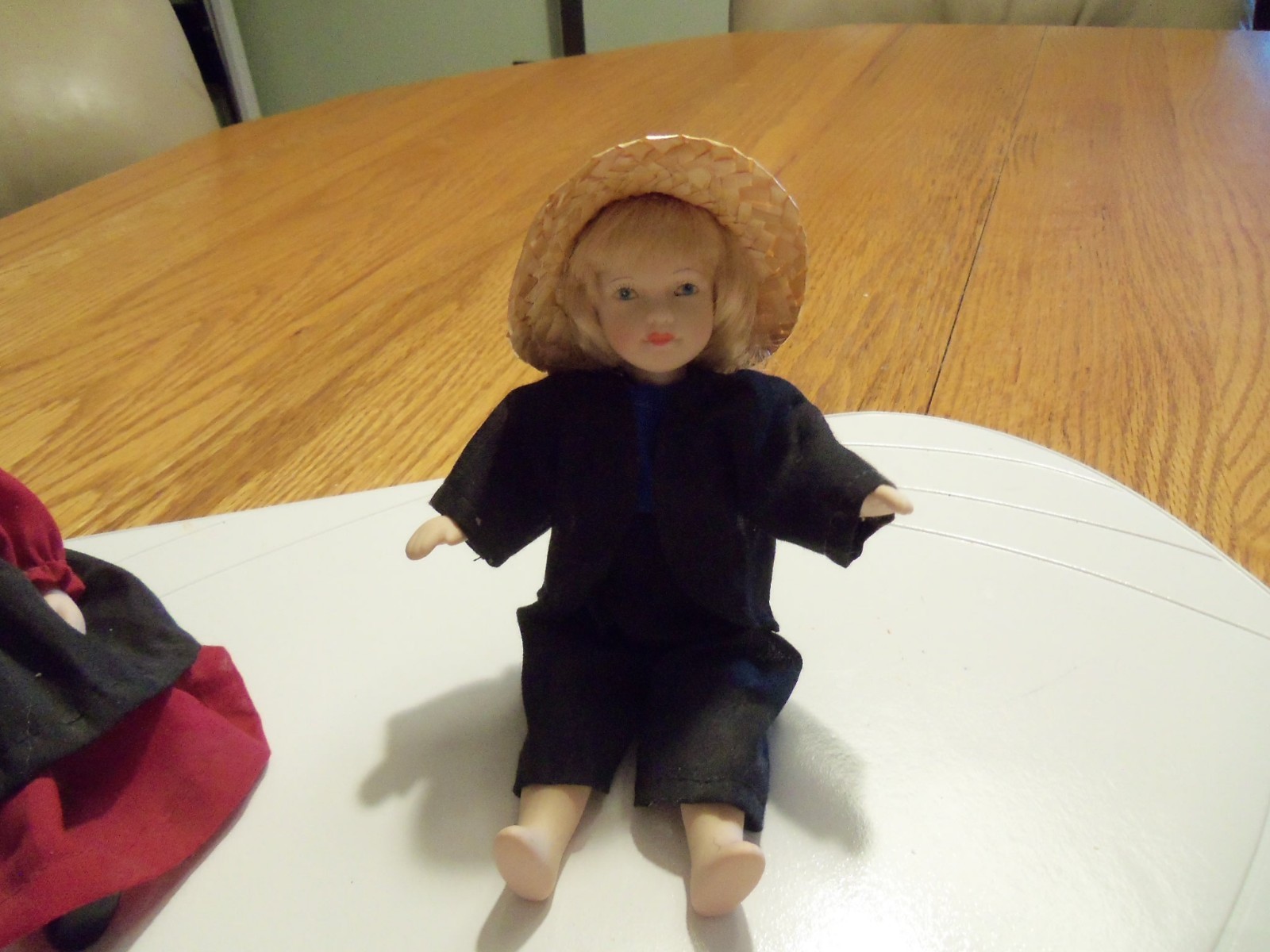 7 1/4 inch Amish Porcelain boy and  girl dolls