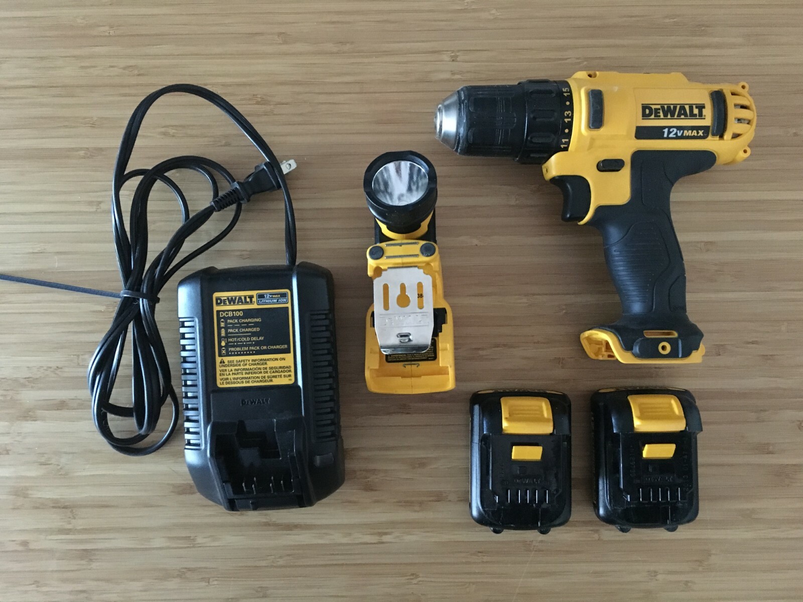 DEWALT bundle: drill-driver, worklight, charger, 2 batteries, and a bag