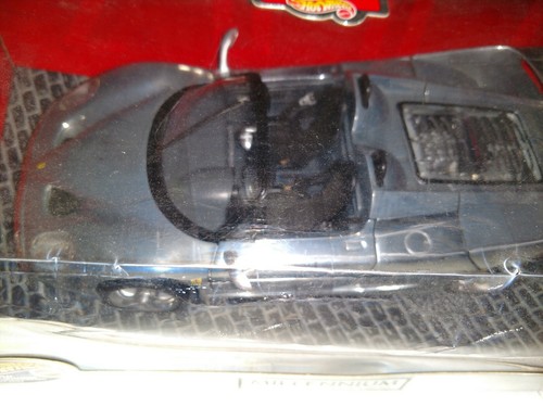 HOT WHEELS MILLENNIUM FERRARI F50 CHROME 1/18 SCALE DIECAST