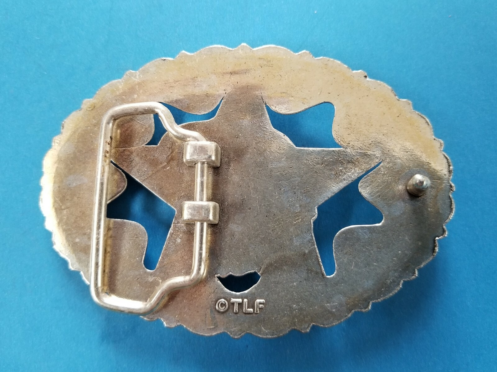 Eagle Head on 5 Point Star Belt Buckle Scrollwork Border Silver and Gold Tones