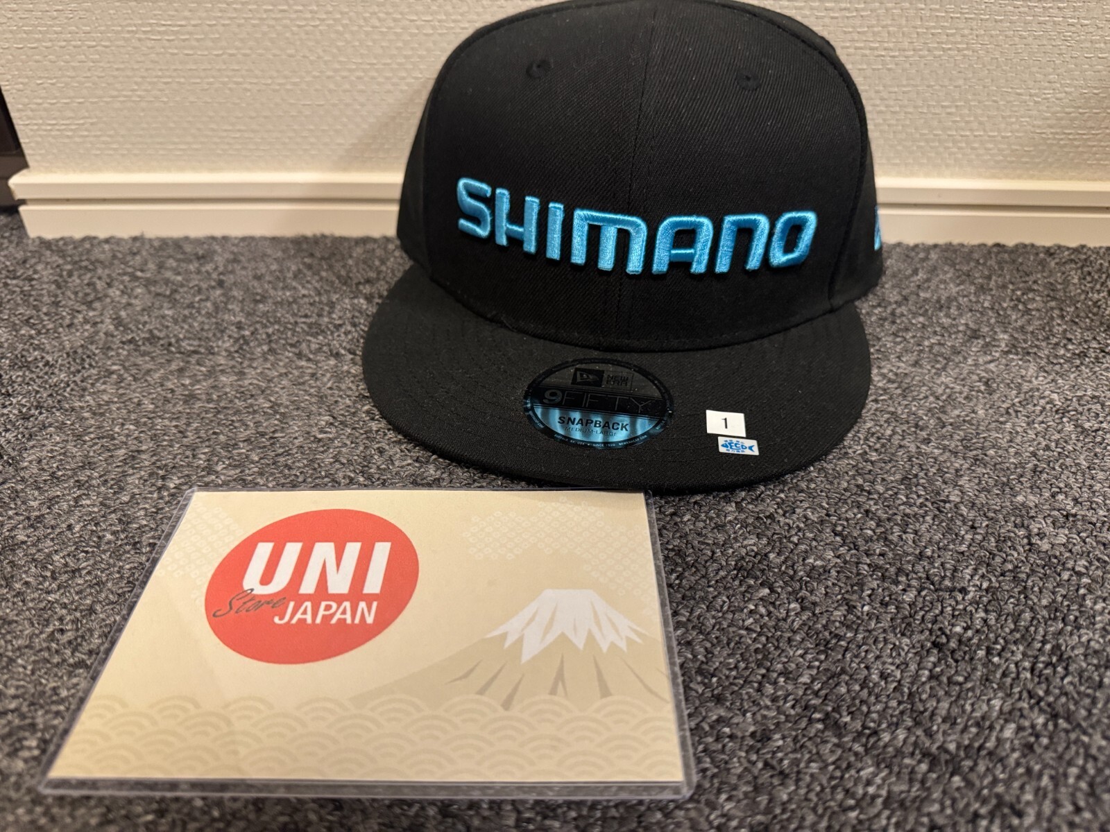 シマノ　ニューエラ SHIMANO x NEW ERA 9FIFTY Snapback Cap Hat Black Blue Fishing