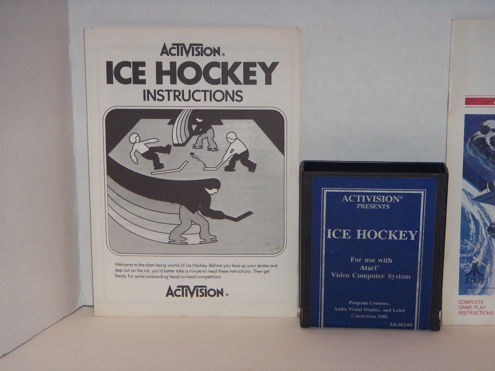 ** Lot of 2 ATARI 2600 Games With Manuals ASTEROIDS and ICE HOCKEY **