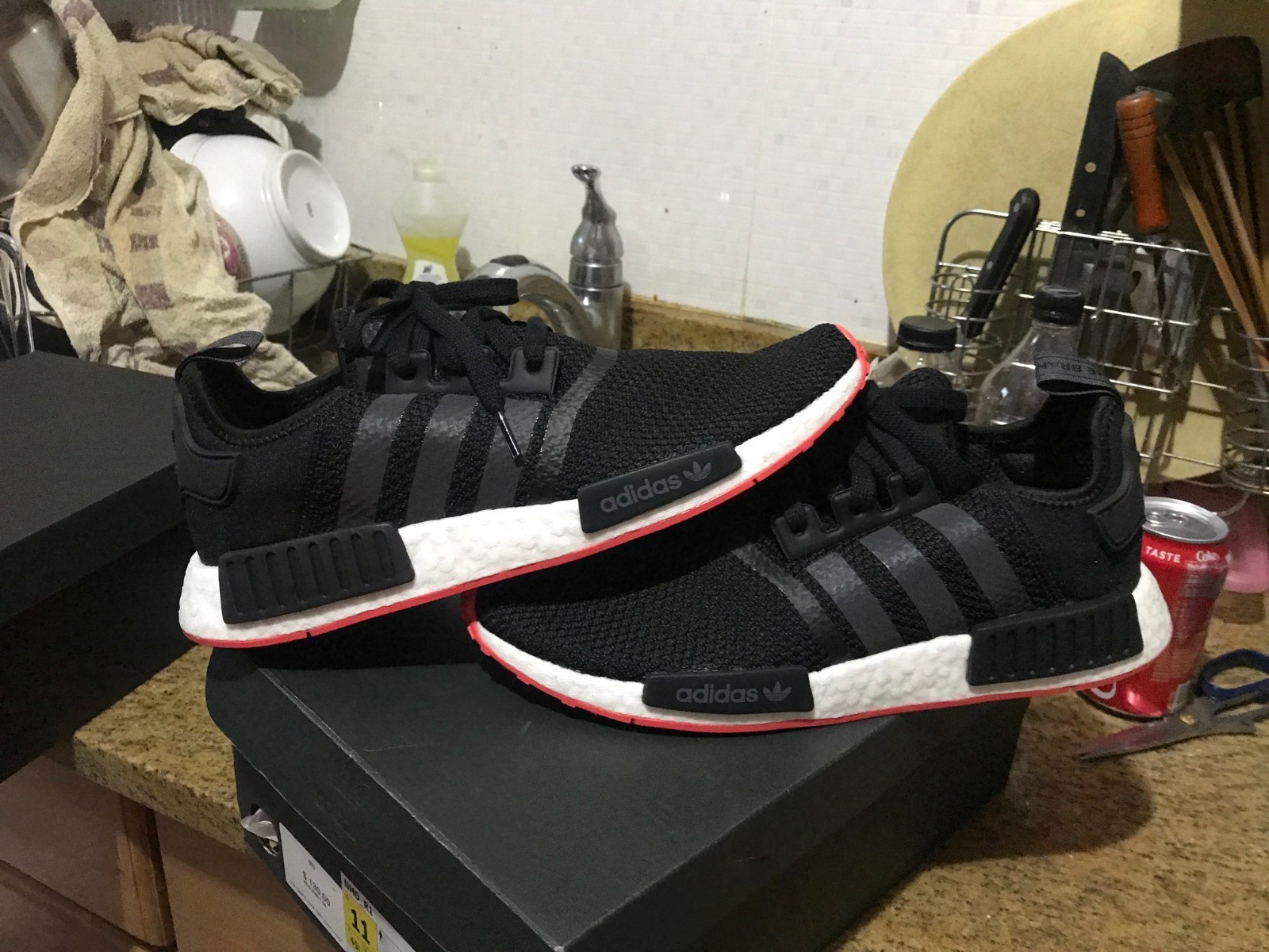 nmd r1 black carbon trace scarlet